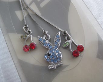 Playboy phone strap, blue rhinestones bunny head with 2 strands of red cherries. can be used as pendant/ charm. Last one.