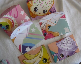 Tooth fairy money mini envelopes, hand crafted from Shopkins new calander pages, a fun and clean way to reward your kid, 7 envelopes