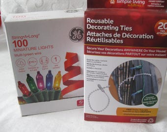 Set of Christmas miniature multicolor string lights and a box of 20 ties to hold them up