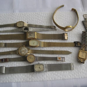 Vintage ladies watches, with brass/stainless steel bands. Non working, for parts, repurpose, jewelry making, other crafty reuse. Lot of 10.