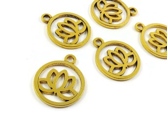 May include: Five gold-colored metal charms with a lotus flower design. Each charm is a circle with a cutout lotus flower in the center.