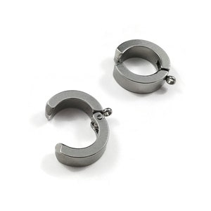 May include: Two silver metal clasps for jewellery making. The clasps are round and have a hinged opening.