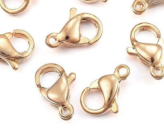 May include: Ten gold-toned metal lobster clasps, a type of jewelry finding used for fastening necklaces, bracelets, and other jewelry.