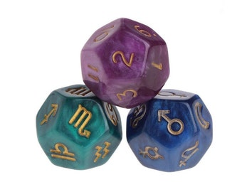 May include: Three purple, green, and blue dice with gold zodiac symbols and numbers. The dice are made of a translucent material and have a sparkly finish.