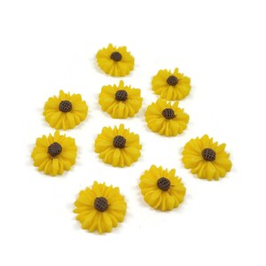Cabochons marguerites jaune en résine