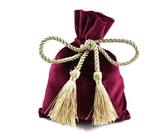 Ruby red velvet pouch bag with tassel rope