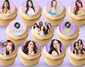 May include: A set of ten cupcakes topped with circular edible toppers featuring individual and group portraits of the music group Katseye, along with two toppers displaying the text Katseye and Happy Birthday with a star logo graphic.