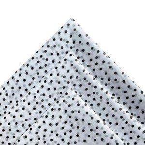 May include: Three sheets of white tissue paper with a black polka dot pattern.