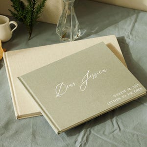 Álbum de recortes personalizado com cartas para a noiva, álbum de recortes para despedida de solteira, livro para festa de despedida de solteira, presente para chá de panela, conselhos para a futura noiva.