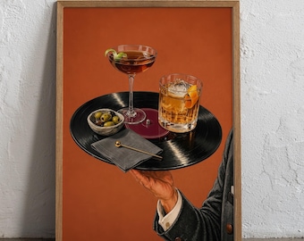 May include: A framed art print featuring a person in a dark gray suit holding a black vinyl record as a serving tray. On the record sits a stemmed cocktail glass with an olive, a rocks glass with an orange peel, a small bowl of olives, and a napkin.