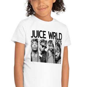 May include: White t-shirt with a black and white image of Juice Wrld and the text "Juice Wrld 999".