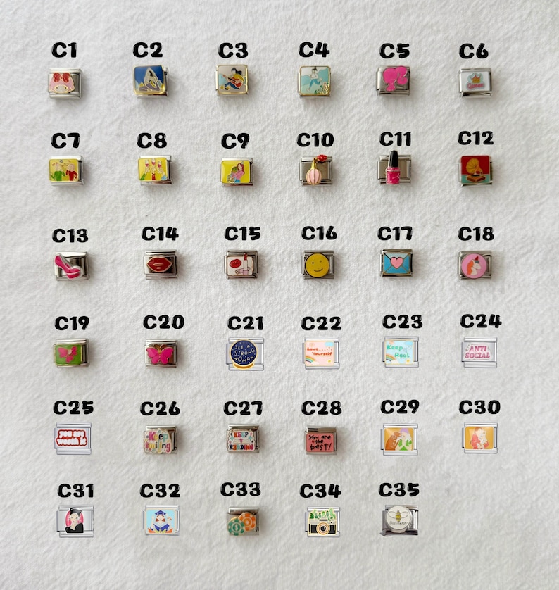 May include: A collection of 35 square charms with various designs, including cartoon characters, smiley faces, and inspirational messages. The charms are silver-toned with colorful enamel details, perfect for bracelets or necklaces.