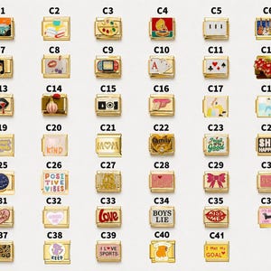 May include: A collection of forty-one rectangular gold-tone modular bracelet links, each featuring a unique enamel graphic or text design. The designs include icons like cars, books, musical notes, playing cards, hearts, and various phrases like SHIT HAPPENS.