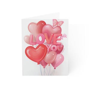 Tarjeta con la palabra TE AMO y globos rosas. Tarjeta de felicitación romántica para San Valentín, aniversario y ocasiones especiales