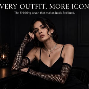 May include: Black fishnet arm warmers featuring a diamond-shaped mesh pattern. The text reads: EVERY OUTFIT, MORE ICONIC. The finishing touch that makes basic feel bold. These accessories extend from the wrist to the upper forearm.