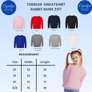 Puede incluir: Una selecci&oacute;n de sudaderas para ni&ntilde;os peque&ntilde;os en varios colores, incluyendo rosa claro, rojo, azul marino y negro. La imagen tambi&eacute;n muestra una tabla de medidas con anchos de 33 cm a 38 cm y largos de 38 cm a 46 cm.