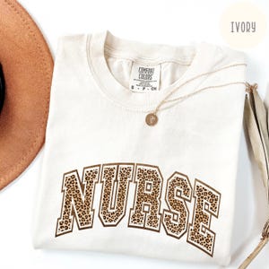 Comfort Colors® Leopard Nurse Shirt, Nurse T-Shirt, Registered Nurse Shirt, Nurse Gift, RN Shirt, Nursing School Shirt