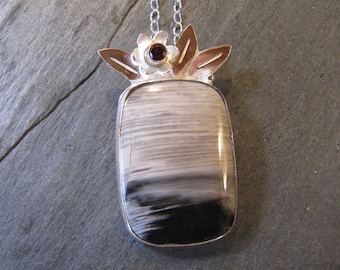 Petrified Ashwood Pendant with Garnet and Leaves in Sterling Silver