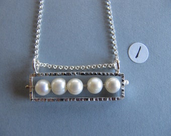 Framed Pearl Pendants in Sterling Silver