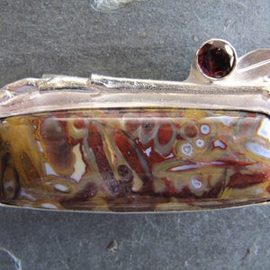 Brooch/Necklace of Fossil Palm, Dogwood, Garnet, and Sterling Silver