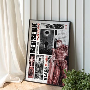 Op de afbeelding: Een ingelijste poster met manga-kunstwerk. De poster toont het woord "BERSERK" in vette letters, samen met Japanse tekst en illustraties van een gepantserde krijger. De woorden "BLACK SWORDSMAN" zijn ook zichtbaar.
