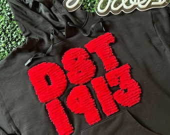 Vrouwenclubhoodie: collegiaal sweatshirt met tapijttextuur