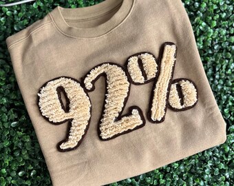 92% Textured Lettering Sweatshirt: Trendy Statement Piece