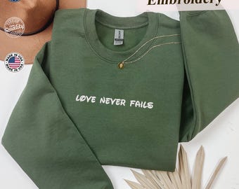 Love Never Fails Embroidered Sweatshirt and Hoodie, Religious/Faith Sweatshirt, Bible Verse Shirt, Christian Minimalist Sweatshirt
