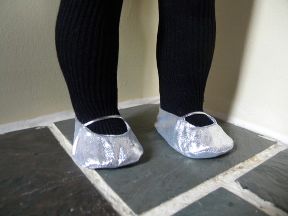 flats with straps across foot