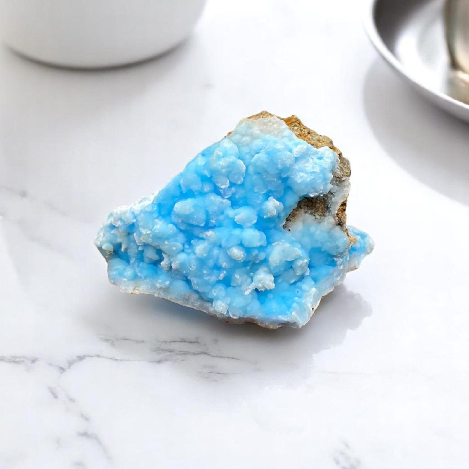 Blue aragonite crystal for balancing Capricorn energy by promoting emotional equilibrium and sustainable progress.