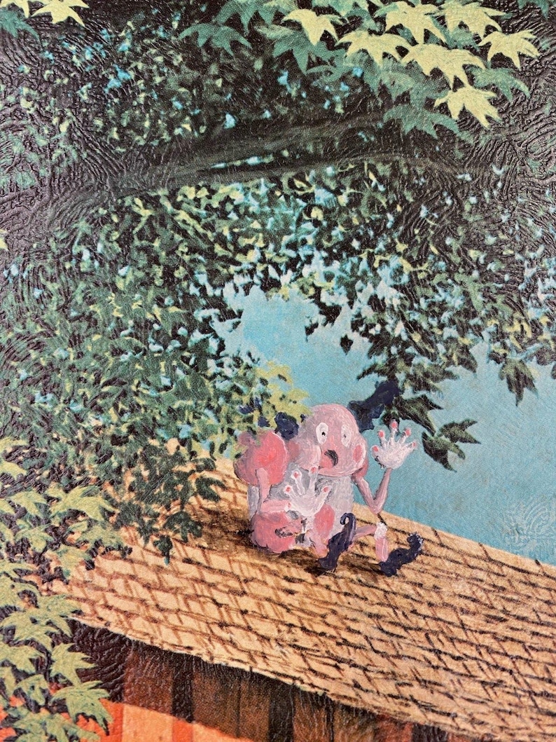May include: A pink cartoon creature with large eyes and five fingers on each hand sits on a thatched roof. The creature is looking up and has a surprised expression. The roof is brown and has a green leafy tree in the background.
