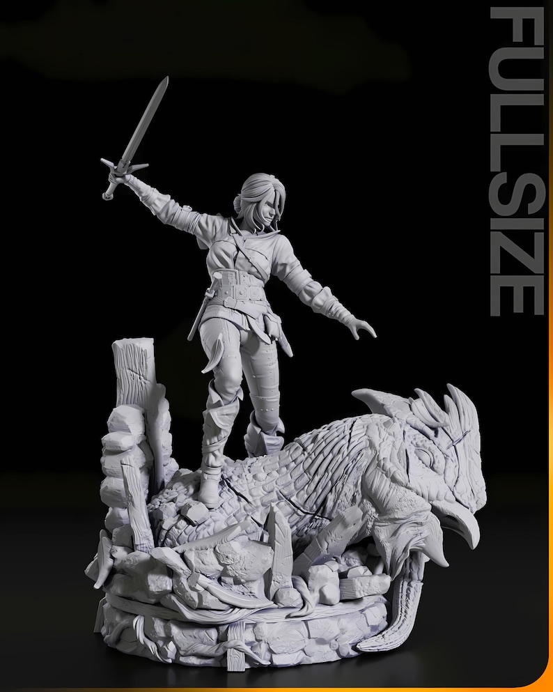 May include: A detailed figurine of a woman with a sword, standing atop a creature with a textured hide. The figure is set on a rocky base with wooden posts. The word "FULLSIZE" is printed vertically on the right side.