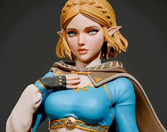 May include: A detailed bust of a female character with blonde hair, pointed ears, and teal eyes. She wears a blue and white dress with gold accents, a brown cape, and a black glove. The figure is a stylized representation of a video game character.