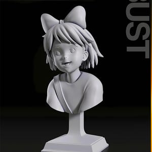 May include: A gray bust sculpture of a young girl with a large bow in her hair. The sculpture has a detailed face and is mounted on a pedestal. The word "BUST" is printed vertically on the right side of the image.
