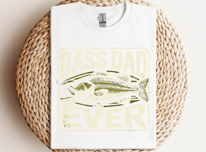 a white t - shirt with a picture of a fish on it