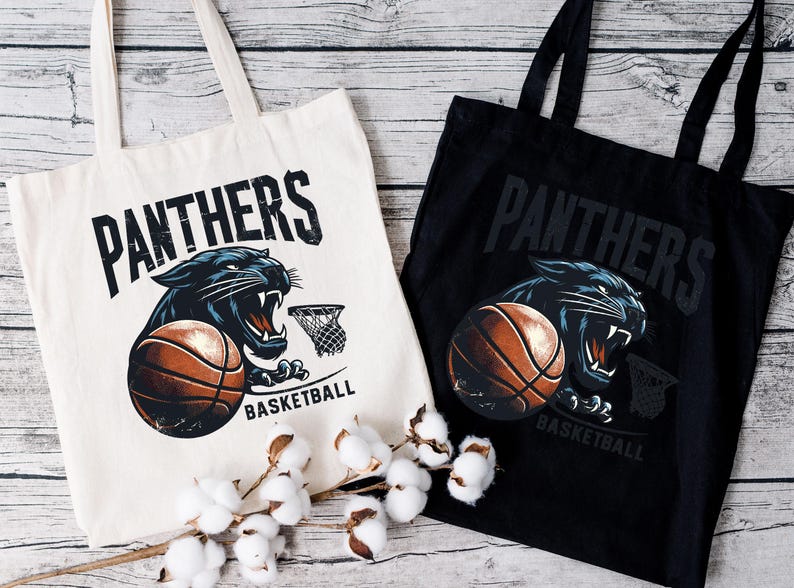 two black and white bags with panther's on them