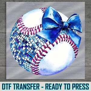 a picture of a baseball with a bow on it
