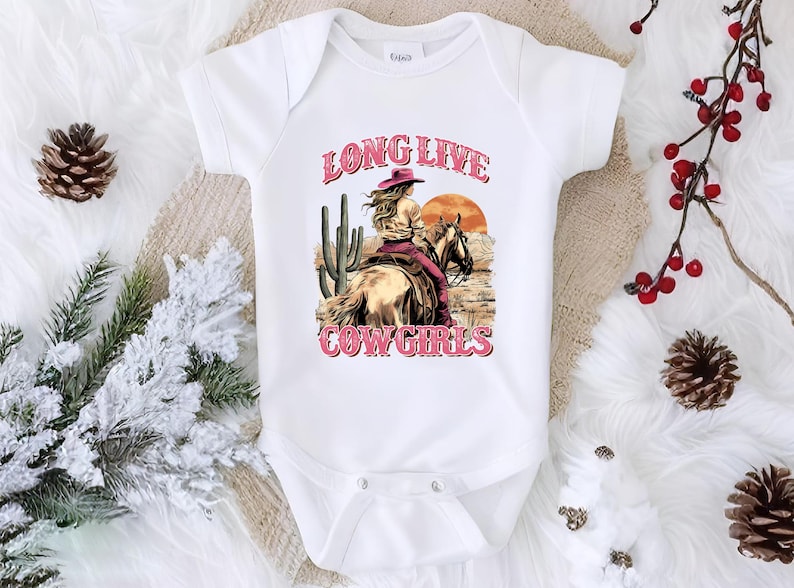 a baby bodysuit with a picture of a cowboy on it