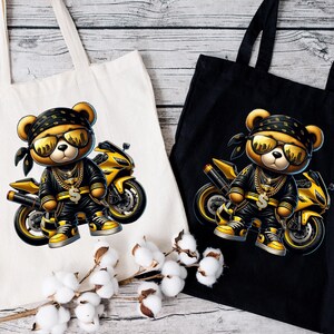 two black and yellow teddy bears on motorcycles on a tote bag