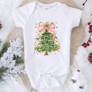 a baby bodysuit with a christmas tree on it