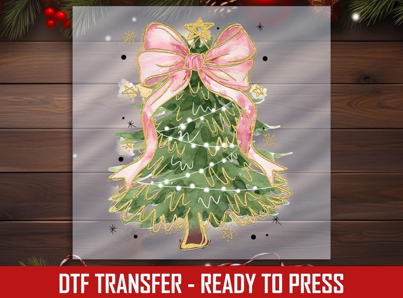 a picture of a christmas tree with a pink bow