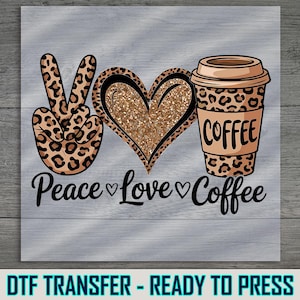 May include: A graphic design featuring a peace sign, a heart, and a coffee cup, all with a leopard print pattern. The words "Peace Love Coffee" are written below in a script font. The background is a light gray wood grain.