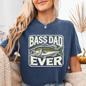 a woman wearing a bass dad ever t - shirt