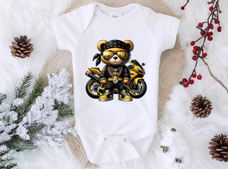 a baby bodysuit with a teddy bear riding a motorcycle
