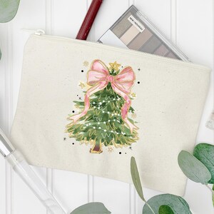 a makeup bag with a christmas tree on it