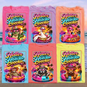 May include: A collection of six colorful t-shirts, each featuring a unique graphic design. The shirts display the text "Hotter Than a Hoochie Coochie" in a vibrant, retro font. Each shirt showcases a different animal wearing sunglasses and floating in a pool float.