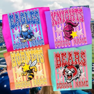May include: Four colorful t-shirts with school mascot designs. The shirts feature the words "EAGLES", "KNIGHTS", "HORNETS", and "BEARS" with corresponding graphics of an eagle, knight's helmet, bee, and bear. Each shirt has the text "SCHOOL NAME".