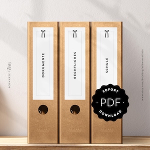 May include: Three brown file folders with white labels and black text. The labels read "Dokumente", "Rechtliches", and "Schule". Each label has a small black bow at the top. A black circle with the words "SOFORT PDF DOWNLOAD" is in the lower right corner.