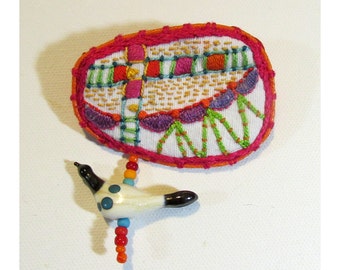 Hand Embroidered Colorful Pin with Hand Blown Glass Spotted Bird