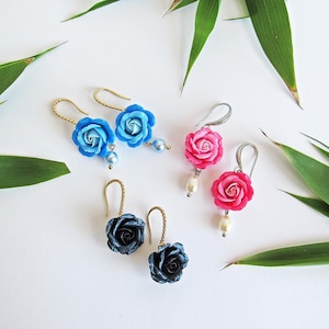 Rose and pendants dangle earrings. Colorful polymer clay roses for lovers of boho style and handmade jewelry